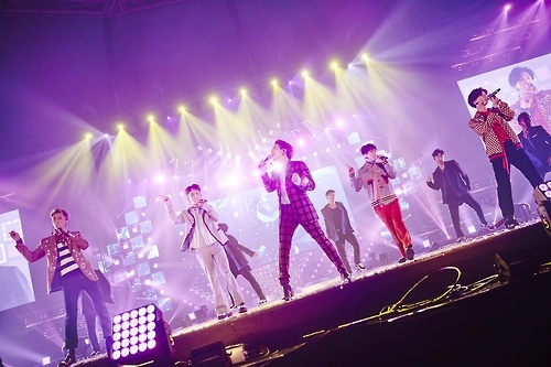 SHINee performs at Olympic Park in Seoul in this photo provided by S.M. Entertainment. (Yonhap)