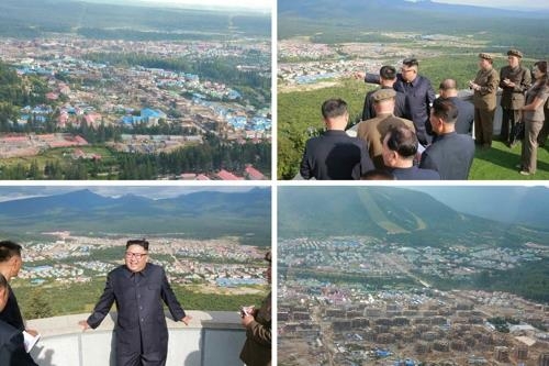These photos released by the Korean Central News Agency on Aug. 19, 2018, show North Korean leader Kim Jong-un visiting construction sites in Samjiyon County. (For Use Only in the Republic of Korea. No Redistribution) (Yonhap)