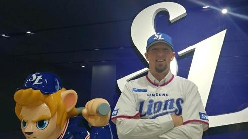 American pitcher Deck McGuire in his new Samsung Lions uniform after signing with the Korea Baseball Organization club on Nov. 29, 2018, in this photo released by the team. (Yonhap)