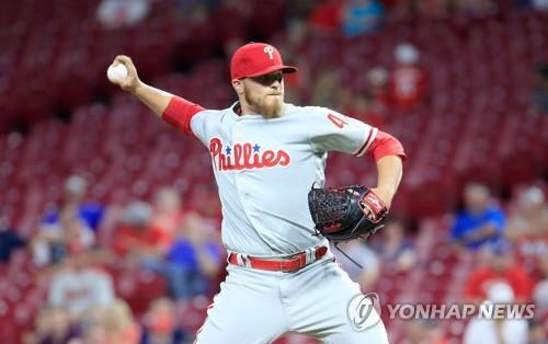 In this Getty Images file photo from July 26, 2018, Jake Thompson of the Philadelphia Phillies throws a pitch against the Cincinnati Reds in the bottom of the ninth inning of a Major League Baseball regular season game at Great American Ball Park in Cincinnati, Ohio. (Yonhap)