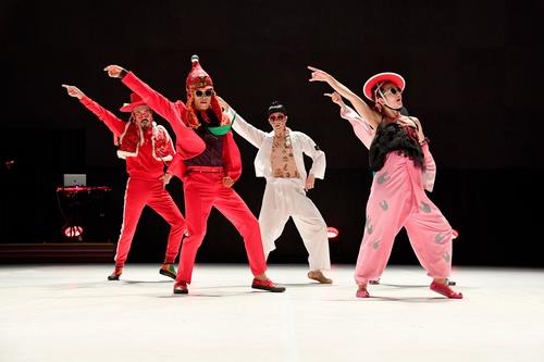 This undated photo, provided by Ok Sang-hoon, shows the Ambiguous Dance Company performing "Fever." Kim Bo-ram, the group's artistic director, is seen on the left wearing a red track suit and a vest. (PHOTO NOT FOR SALE) (Yonhap)