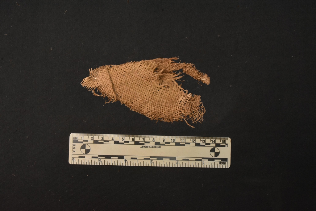 This photo, provided by the defense ministry on June 18, 2021, shows a piece of fabric found at Mount Baekseok in Yanggu, some 175 kilometers northeast of Seoul, where the remains of the 1950-53 Korean War soldier Ssg. Ko Byung-soo were discovered. (PHOTO NOT FOR SALE) (Yonhap)
