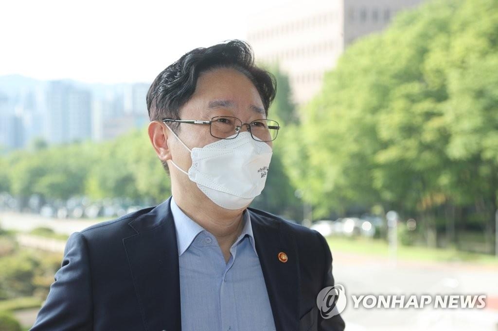 Justice Minister Park Beom-kye answers questions from reporters outside his office in Gwacheon, south of Seoul, on July 28, 2021. (Yonhap)