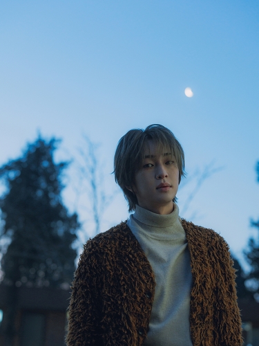 Onew, leader du boys band de K-pop SHINee, sur une image concept de son premier album studio. (Photo fournie par SM Entertainment. Revente et archivage interdits)