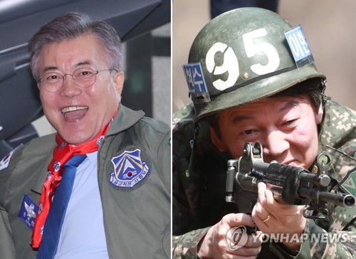(평택·인천=연합뉴스) 배재만 홍해인 기자 = 더불어민주당 문재인 대선후보와 국민의당 안철수 후보가 7일 안보 행보를 펼쳤다. 문 후보는 경기도 평택 공군작전사령부 등 상급 부대를 방문해 빨간마후라와 점퍼로 옷을 갈아입었고, 안 후보는 육군 17사단 신병교육대대를 방문해 훈련병을 만나 사격 예비훈련을 했다. 2017.4.7
