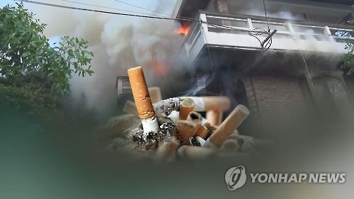 '툭' 버린 담배꽁초, 51억 물어낼 판…법원 "화재 원인" - 1