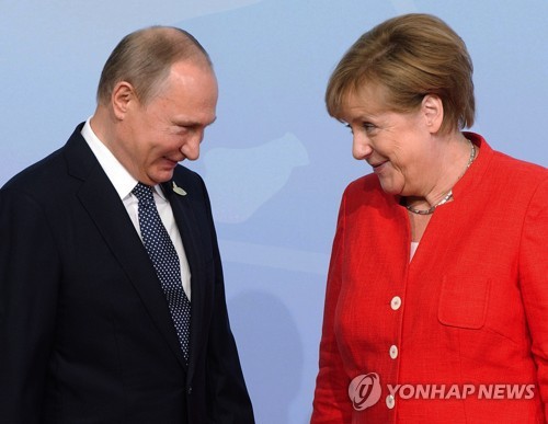G20 정상회의에 참석한 푸틴 러시아 대통령과 메르켈 독일 총리