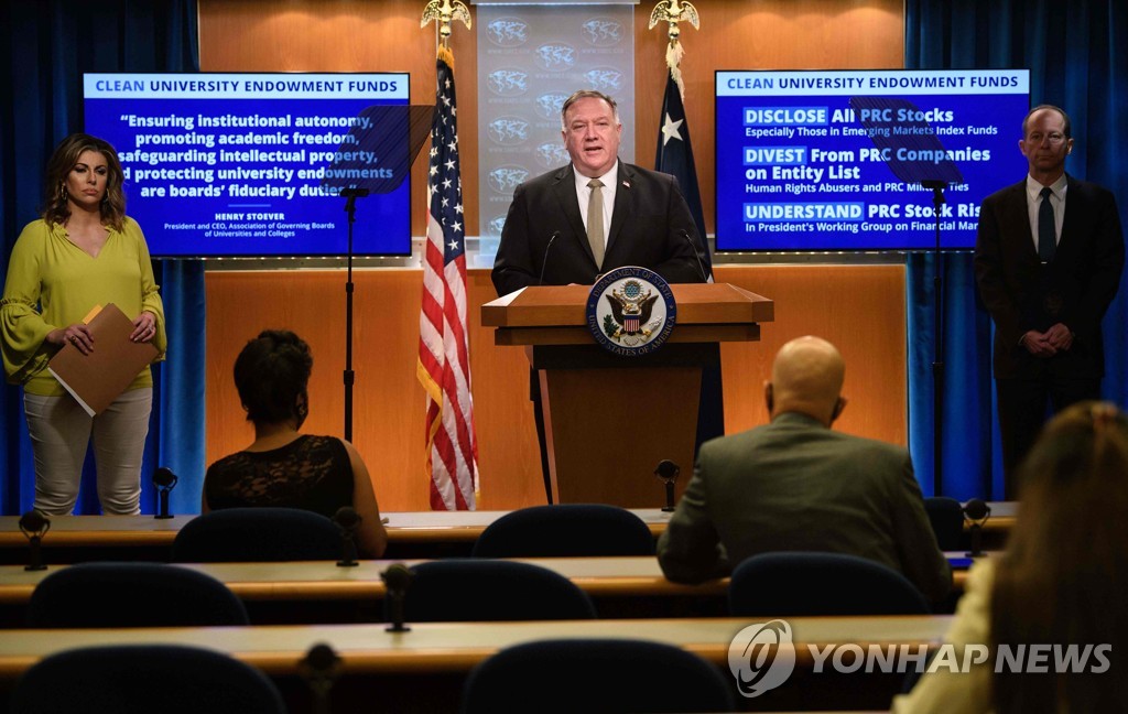 In this AFP photo, taken on Sept. 2, 2020, U.S. Secretary of State Mike Pompeo (at podium) holds a press conference at the Department of State in Washington. (PHOTO NOT FOR SALE) (Yonhap)