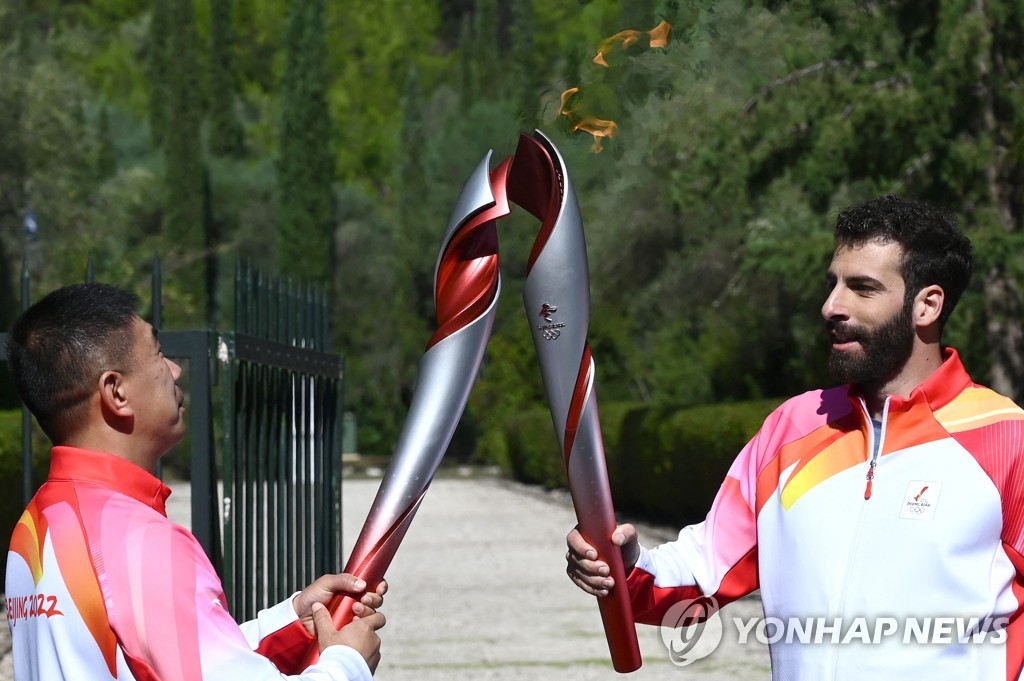 OLY-2022-BEIJING-FLAME-GRE-CHN-HEALTH-VIRUS