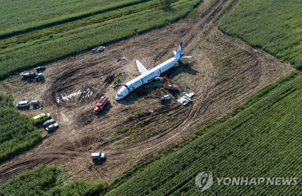 Dismantling Airbus A321 jet at crash landing site near Zhukovsky Airport