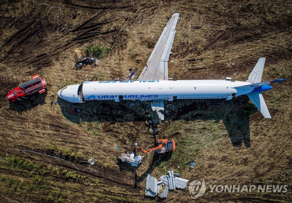 Dismantling Airbus A321 jet at crash landing site near Zhukovsky Airport