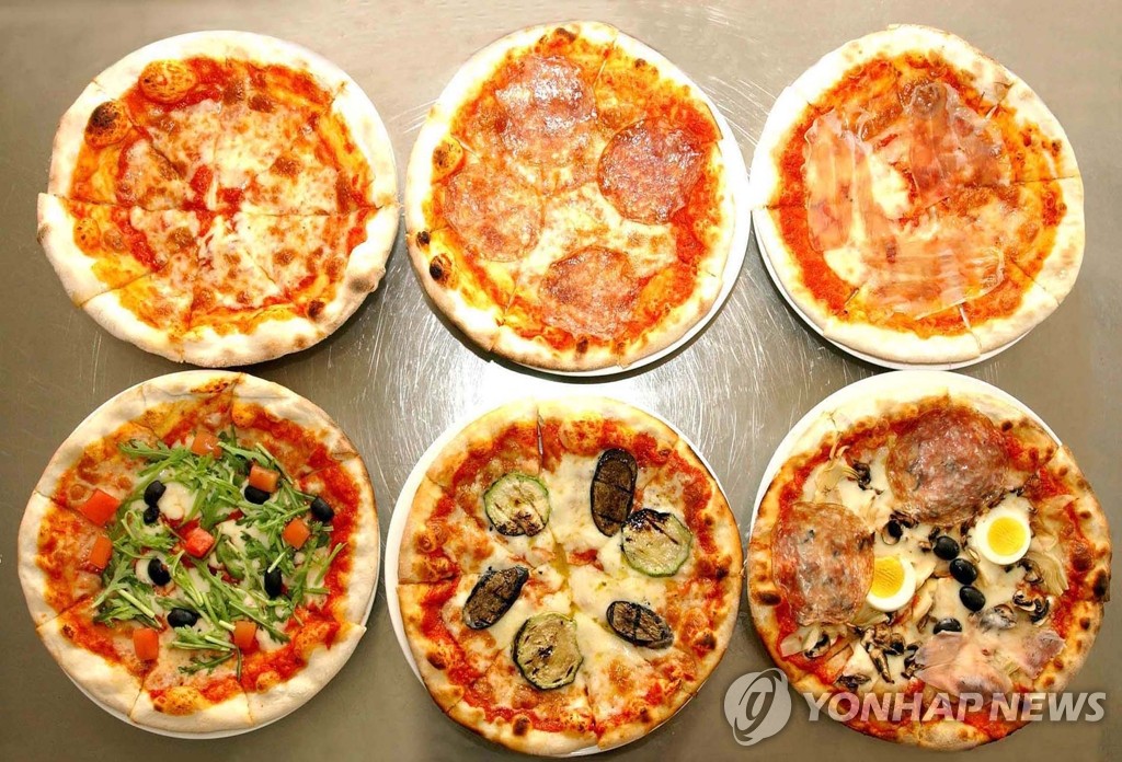 지난 2009년 북한 매체가 보도한 평양 광복거리 이탈리아 요리 전문식당의 피자들<<연합뉴스DB>>