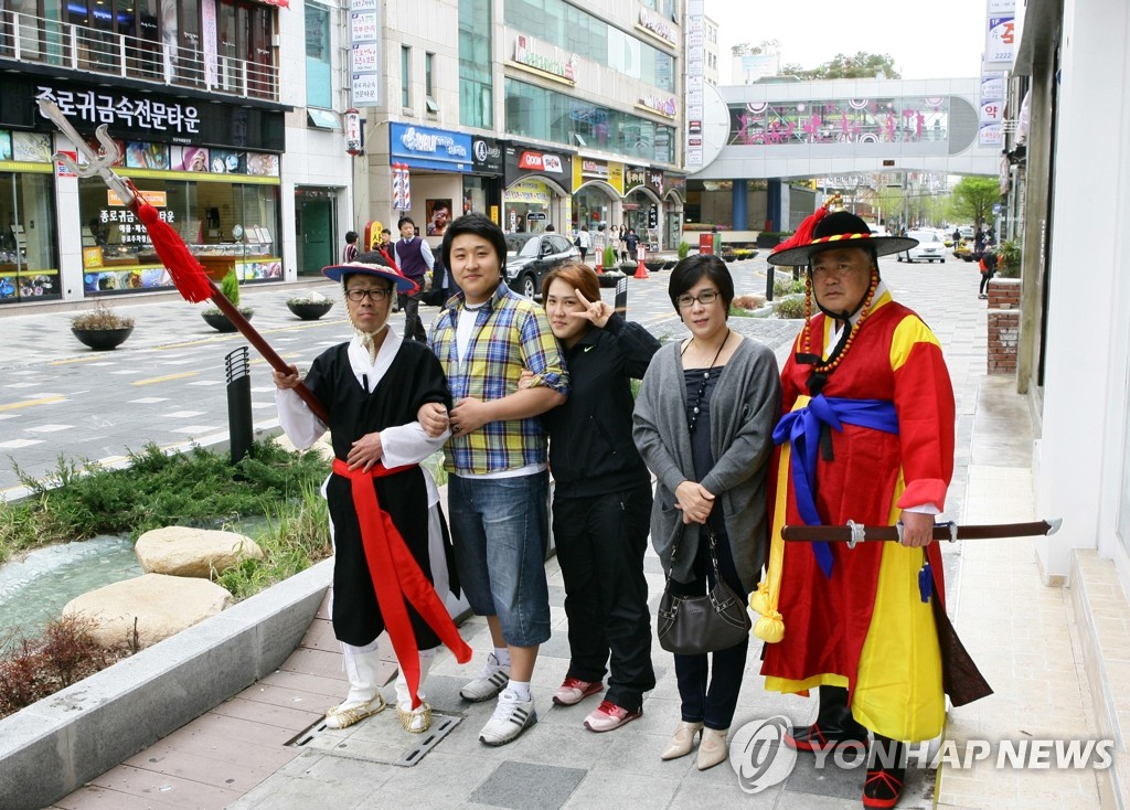 도심의 포도대장과 한 컷