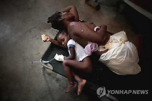 연합국제보도사진전 대상 에밀리오 모레나티 `아이티 콜레라'