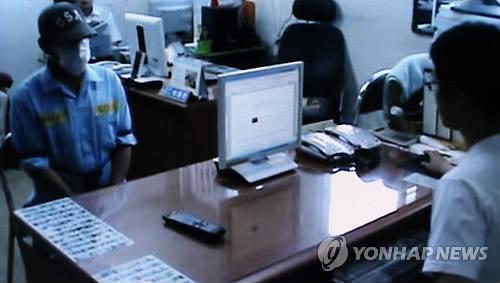 2012년 광진경찰서에서 조사를 받는 이모 씨