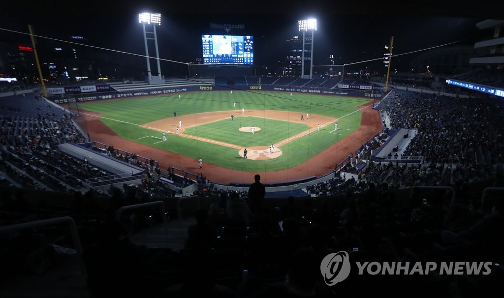Fans attend the first official game at Changwon NC Park in Changwon, 400 kilometers southeast of Seoul, between the home team NC Dinos and the Hanwha Eagles during the Korea Baseball Organization preseason on March 19, 2019. (Yonhap)