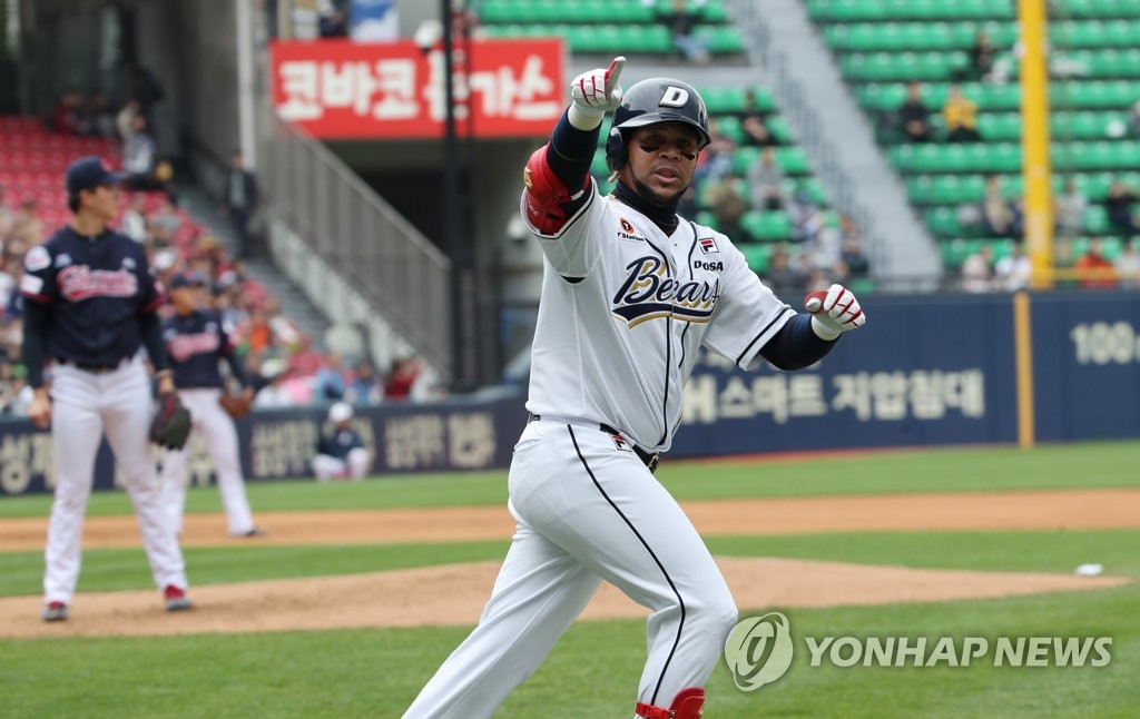 In this file photo from April 28, 2019, Jose Miguel Fernandez of the Doosan Bears points to his dugout after hitting a three-run home run against the Lotte Giants in the bottom of the second inning of a Korea Baseball Organization regular season game at Jamsil Stadium in Seoul. (Yonhap)