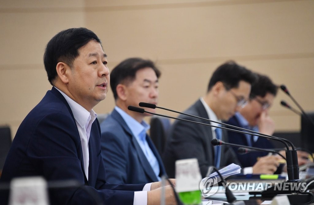 This photo provided by the Ministry of Economy and Finance shows its vice minister, Koo Yoon-cheol (L), speaking during a meeting with officials of other ministries at a government building in Sejong, an administrative hub located 130 kilometers southeast of Seoul, on June 10, 2019. (PHOTO NOT FOR SALE) (Yonhap).
