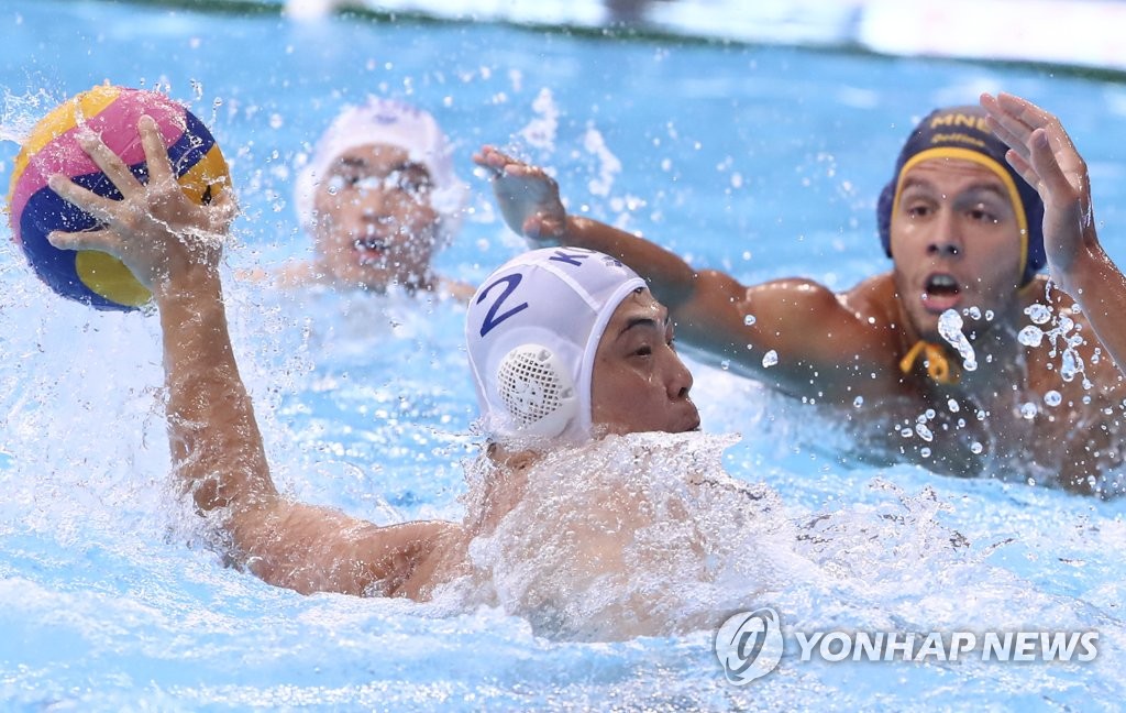S. Korean water polo player takes shot S. Korean water polo player takes shot