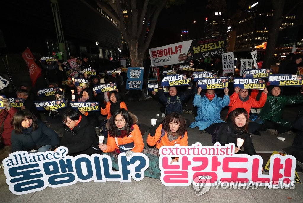 U.S. cost-sharing talks protest U.S. cost-sharing talks protest