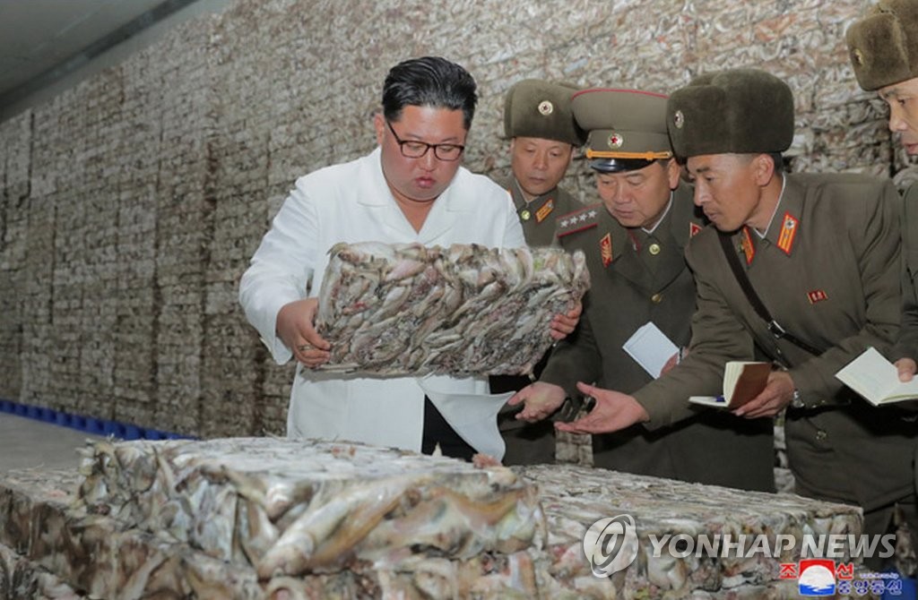 N.K. leader visits fish-processing facility N.K. leader visits fish-processing facility