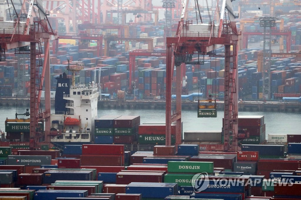 The file photo, taken Dec. 1, 2019, shows export-import containers sitting at South Korea's largest seaport in Busan, located some 450 kilometers south of Seoul. (Yonhap)