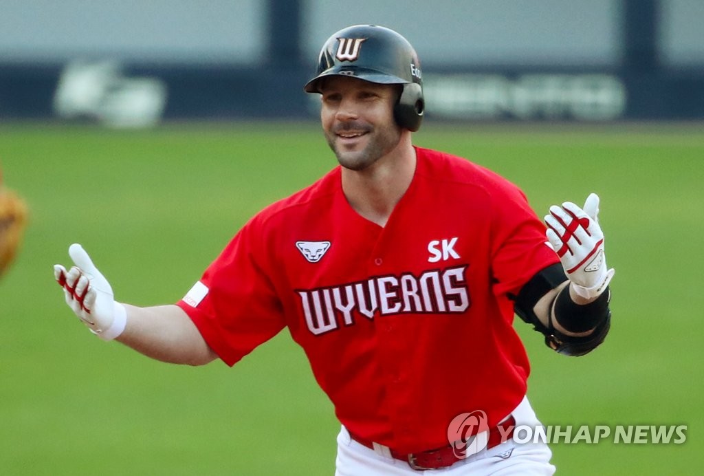 In this file photo from Oct. 11, 2020, Jamie Romak of the SK Wyverns celebrates his double against the Kia Tigers during the top of the ninth inning of a Korea Baseball Organization regular season game at Gwangju-Kia Champions Field in Gwangju, 330 kilometers south of Seoul. (Yonhap)