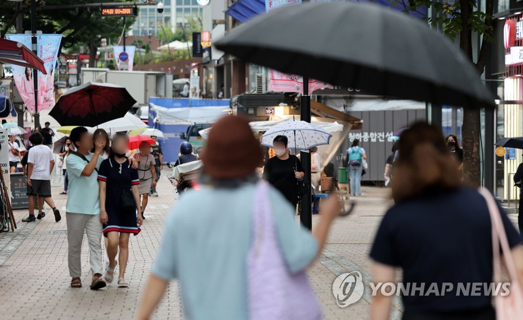 Myeongdong sous la pluie Myeongdong sous la pluie