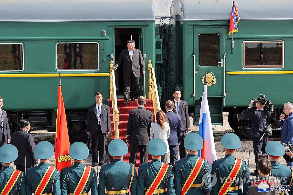 North Korean leader Kim Jong-un (rear) alights from his special train at the Vostochny Cosmodrome space launch center in the Russian Far East on Sept. 13, 2023, to holds talks with Russian President Vladimir Putin, in this photo released by the North's official Korean Central News Agency the next day. (For Use Only in the Republic of Korea. No Redistribution) (Yonhap)