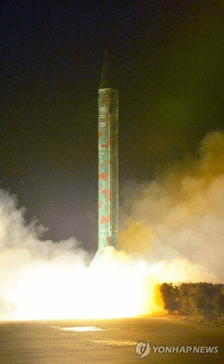 A short-range ballistic missile is launched during a military drill in this photo released by the North's daily Rodong Sinmun on March 11, 2016. (For Use Only in the Republic of Korea. No Redistribution) (Yonhap)