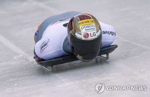 In this Associated Press photo, South Korean skeleton racer Yun Sung-bin speeds down the course during the men's skeleton World Cup in Konigssee, Germany, on Jan. 28, 2017. (Yonhap)