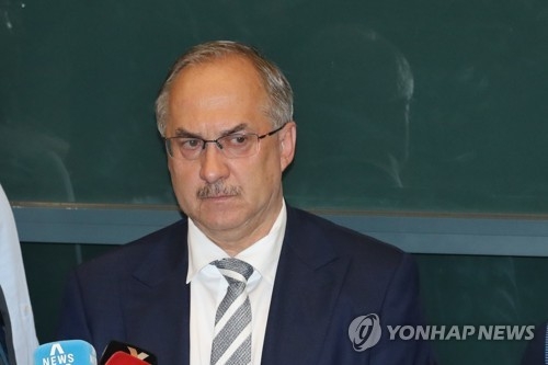 Uli Stielike, head coach of the South Korean men's national football team, listens to a reporter's question at Incheon International Airport on June 14, 2017, after returning from a 3-2 loss to Qatar in the World Cup qualifying match. (Yonhap)