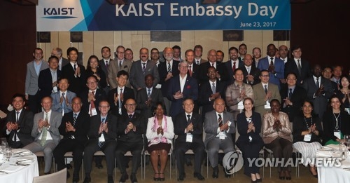(2nd L) S. Korea's top tech university courts bright int'l students, faculty - 2