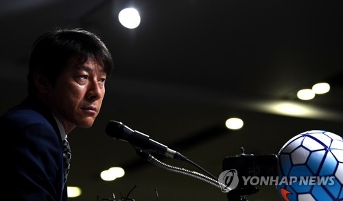 New South Korea national football team head coach Shin Tae-yong listens to questions at a press conference at the Korea Football Association headquarters in Seoul on July 6, 2017. (Yonhap)