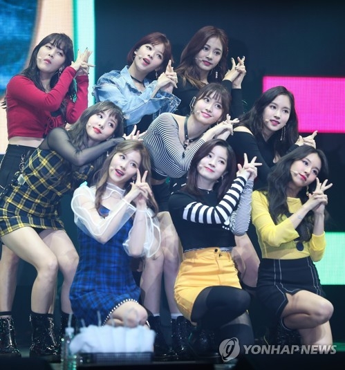 This file photo shows K-pop group TWICE during a media showcase at Yes24 Live Hall in eastern Seoul on Oct. 30, 2017. (Yonhap)