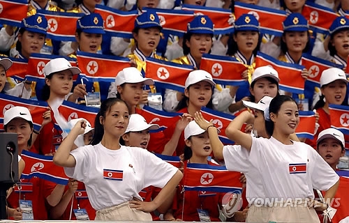 This file photo shows a North Korean cheering squad at the 2002 Asian Games in South Korea's southeastern port city of Busan in 2002. (Yonhap)