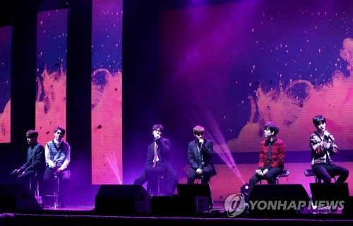 Boy band INFINITE performs on stage during a media showcase for its third studio album "Top Seed" at Blue Square Hall in central Seoul on Jan. 8, 2018. (Yonhap)