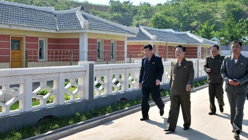 A June 5, 2018, photo from the Rodong Sinmun shows Choe Ryong-hae (2nd from L) visiting the Poman Co-op Farm in Sohung County, south of Pyongyang. (For Use Only in the Republic of Korea. No Redistribution) (Yonhap)
