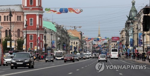 This photo shows 2018 FIFA World Cup banners hanging over a street in Saint Petersburg, Russia, on June 11, 2018. (Yonhap)