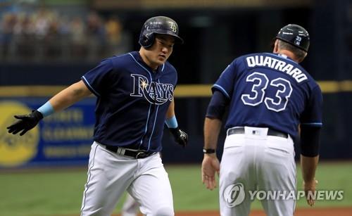 Ji-Man Choi of the Tampa Bay Rays rounds the bases after hitting a News  Photo - Getty Images