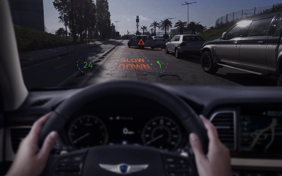 This virtual image provided by Hyundai Motor Group shows how the holographic AR navigation system works in a G80 sedan. (Yonhap)