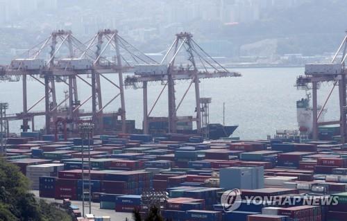 This file photo, taken May 1, 2020, shows stacks of import-export cargo at South Korea's largest seaport in Busan, 450 kilometers south of Seoul. (Yonhap)