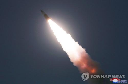 This photo captured from the homepage of the Korean Central News Agency on March 22, 2020, shows the launch of a newly developed tactical weapon at an undisclosed location in North Korea the previous day. (For Use Only in the Republic of Korea. No Redistribution) (Yonhap)