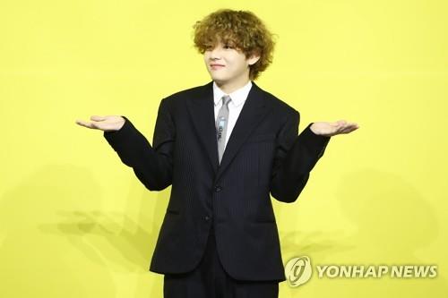 This May 21, 2021, photo shows BTS member V posing during the band's press conference for the song "Butter" in southeastern Seoul. (Yonhap)