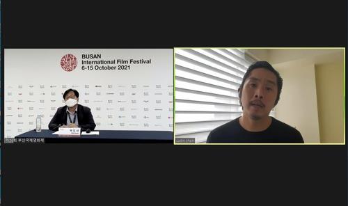 This screenshot image provided by the Busan International Film Festival shows Korean American director and actor Justin Chon of "Blue Bayou" speaking at a Zoom press conference held on Oct. 12, 2021. (PHOTO NOT FOR SALE) (Yonhap)
