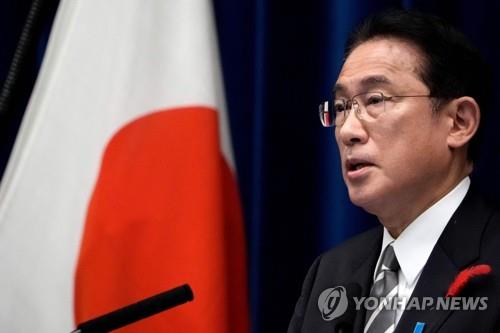 This AFP photo shows Japanese Prime Minister Fumio Kishida holding a press conference in Tokyo on Oct. 14, 2021. (PHOTO NOT FOR SALE) (Yonhap) 