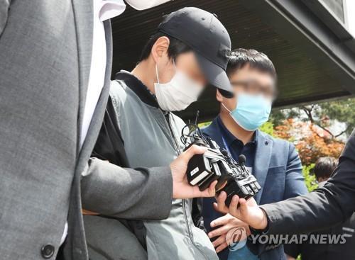 This file photo shows a 36-year-old man convicted of murder by child abuse after beating his adopted daughter to death. (Yonhap)