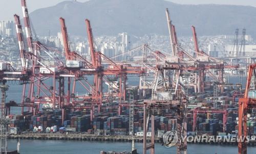 This Jan. 11, 2021, file photo shows stacks of containers at a port in South Korea's southeastern city of Busan. (Yonhap)