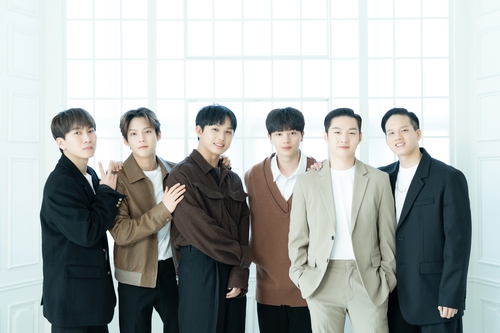 K-pop boy group BTOB poses for the camera during an online press conference for its new album on Feb. 21, 2022, in this photo provided by Cube Entertainment. (PHOTO NOT FOR SALE) (Yonhap)