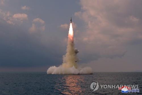In this photo released Oct. 20, 2021, by North Korea's official Korean Central News Agency, a new type of a submarine-launched ballistic missile (SLBM) is test-fired the previous day. The South Korean military said on Oct. 19 that North Korea fired what appears to be an SLBM from waters east of Sinpo, a city on the North's east coast. (For Use Only in the Republic of Korea. No Redistribution) (Yonhap)